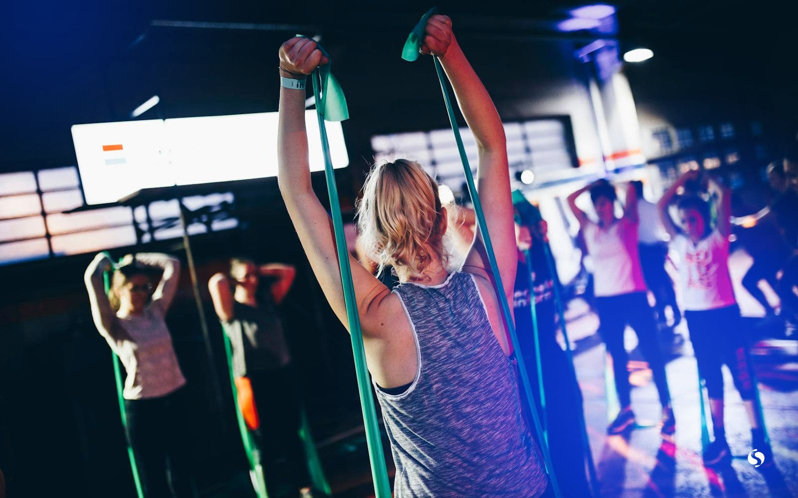 A group class working out in a gym