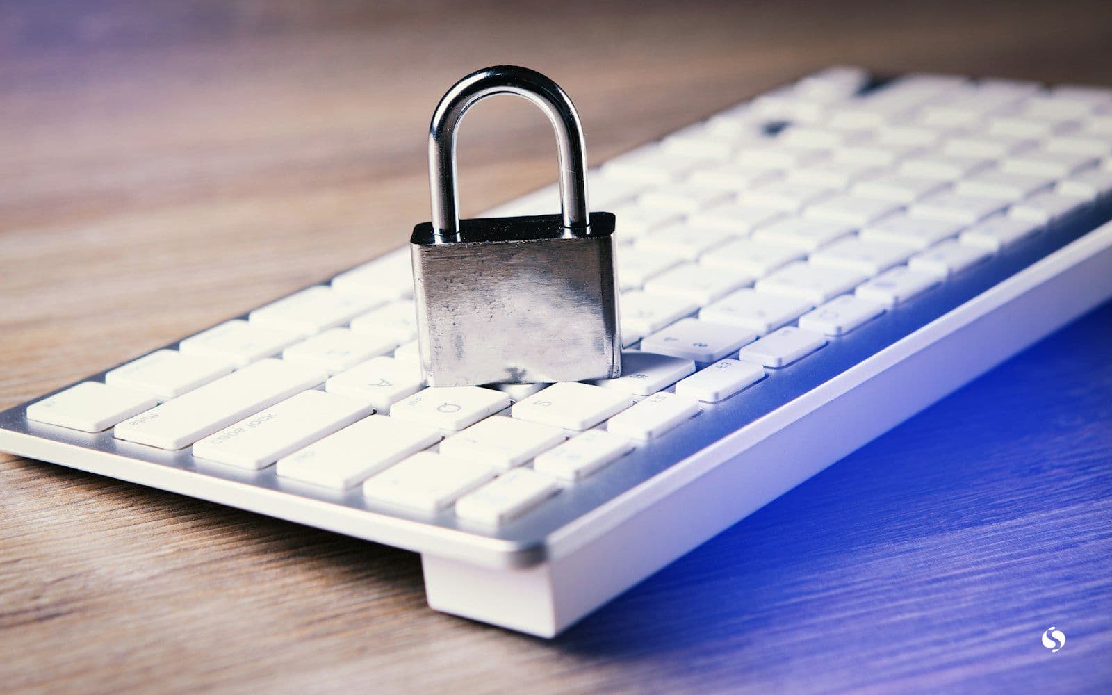 A padlock resting on a keyboard